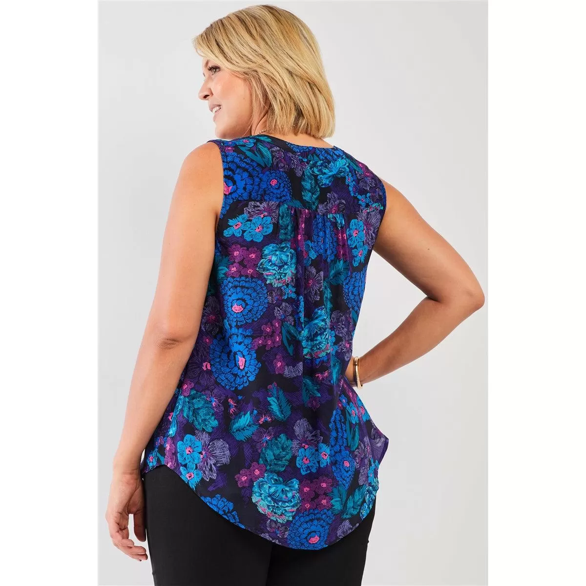 Plus size floral print sleeveless button down top