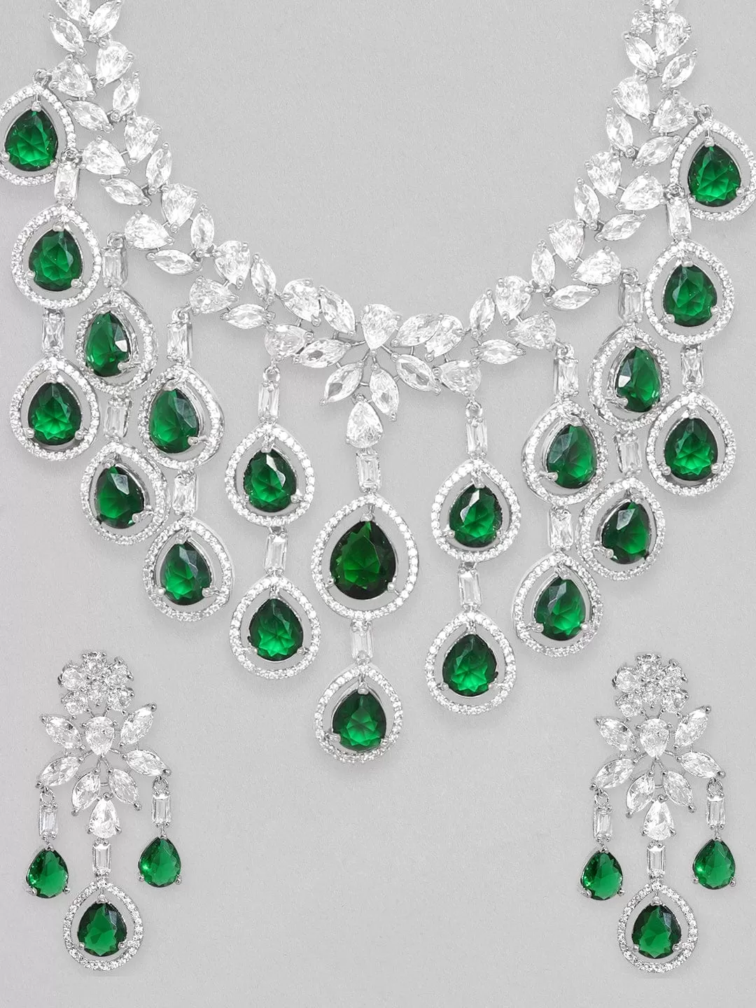 Rubans Rhodium Plated Emerlad Green Oval Zirconia Tassel Drop Silver Necklace Set.